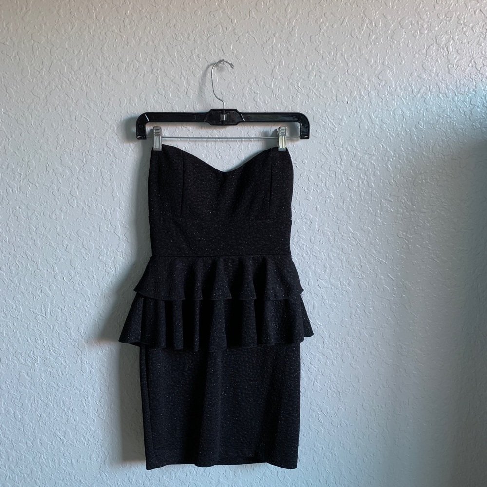 Short black dress.